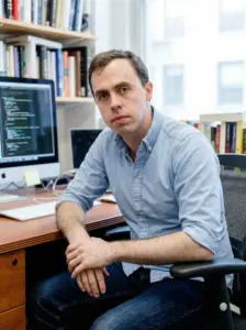 Illustrated portrait of Paul Christiano, AI alignment researcher and former OpenAI safety lead